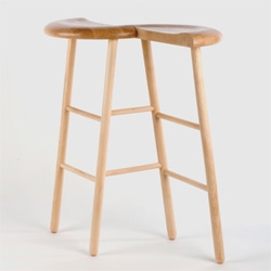 Peter J Pless' Tryst stool is a fun twist on the traditional wooden stool, suddenly creating an intimate seating space for two to scheme or whisper sweet nothings... balancing each other (alone you WILL topple, i tried it!)