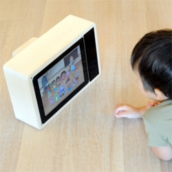 iPad turned into a gorgeous wooden retro TV!!! Designed by frog Creative Director Jonas Damon (if his style looks familiar, you prob remember his areaware flashlights, etc)