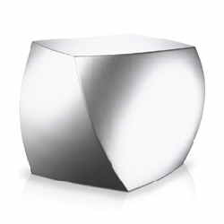 the ultracube is a shiny-curvy metallic piece of  Frank Gehry goodness, available in silver white and black at HellenOnline.