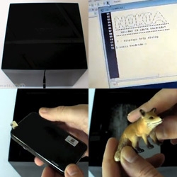 Nokia n900 ~ my mind is blown by this unboxing video... it came in a big glossy black cube... with only a usb port. Plug it in to open it up... and it even as a plastic fox inside!