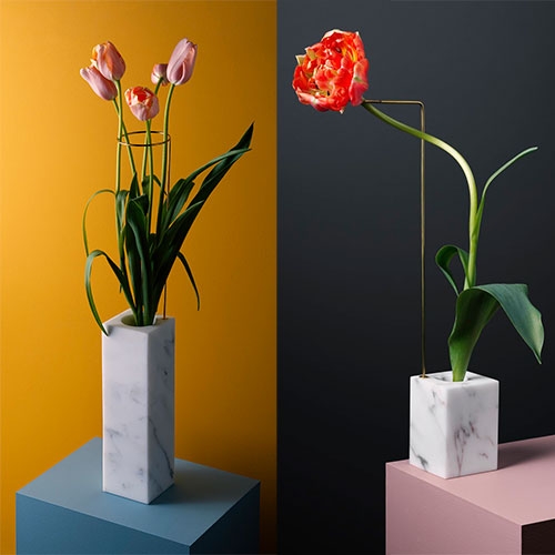 Bloc Studios x Carl Kleiner Postures Vases inspired by Kleiner's 2014 series "postures" - the flowers, mounted on a construction of metal wires and marble bases can easily be positioned in different angles by creating sculptural shapes.
