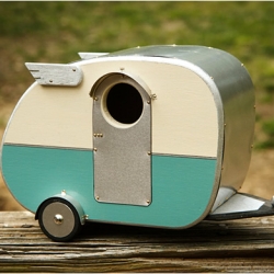 The Vintage Camper Birdhouse was inspired by the Shasta campers of the 1950s. 