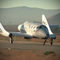 Video footage of Virgin Galactic's 'VSS Enterprise' as she is released from her mothership, 'VMS Eve' and glides back down to Mojave Space Port.
