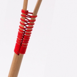 The Walking Stick by Itay Laniado is made out of one broomstick, sliced in the middle. the cord gives it structure and makes sure it would not break.

