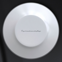 This plate looks like an ordinary plate, but the bottom is printed with undeniable, provocative, bitter and indigestible sentences about hunger statistics in the world in heat sensitive ink.