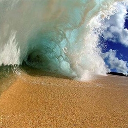 Staggeringly beautiful images shot from inside the curls of waves.