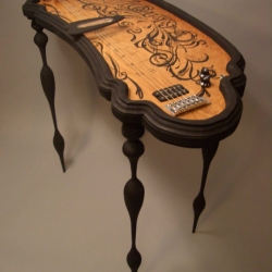 "Oujia Board Slide Guitar"  by  Nicholas Holcomb