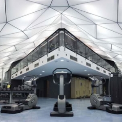 This futuristic fitness center by 4of7 Architecture features 390 backlit panels in different shape and size suspended from the ceiling, fulfill the client request of a ‘cloud-like’ interior.