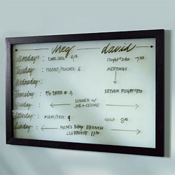Apparently pottery barn has realized that framing frosted glass makes a much prettier variation to the white board... i want one!