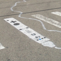 Wiimote street art in Darien, Illinois on a zebra crossing