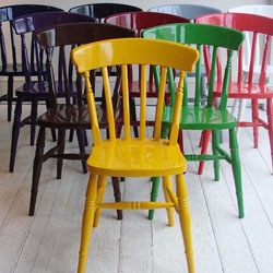 London designer Christopher Howe's custom-painted Windsor chairs are all about the paint. "We should all have at least one in a heart-rending color," Howe says.