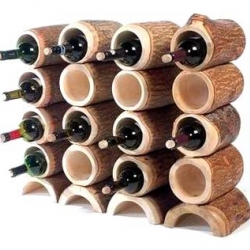 New "treehouse" wine racks by Craig Anczelowitz made from farmed mangowood  for company United Arts based in Chiang Mai, Thailand