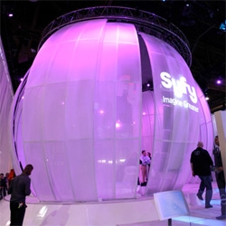 Syfy at CES ~ a huge glowing orb with rotating panels... and you can go inside! Pictures weren't doing it justice, so check out the video to make more sense of it!